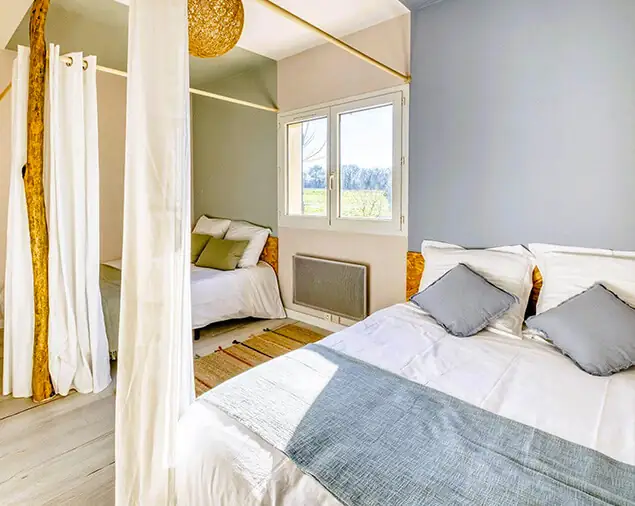 chambre avec deux lites doubles Grand Cottage Peyrole