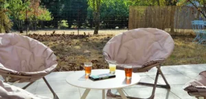 Salon de jardin, terrasse du Cottage Jacuzzi Bien Etre Piscine chauffée