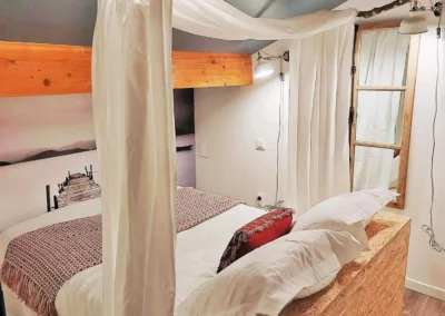Loft room with double bed and false window