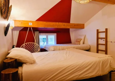 Room with double bed and single bed Loft Nature Bien Etre vacation rental booking