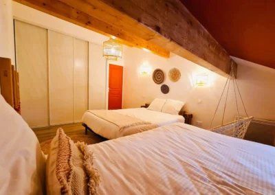 Room with double bed and single bed Loft Nature Bien Etre vacation rental booking