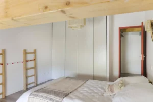 Room with double bed and single bed Loft Nature Bien Etre vacation rental booking