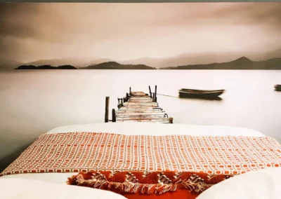 Loft room with double bed and false window