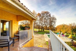 Terrace with garden furniture and outdoor dining table overlooking the countryside
