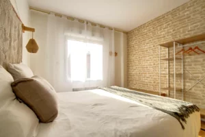 Master bedroom with queen-size bed, walk-in closet and en-suite shower room