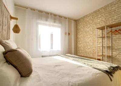 Master bedroom with queen-size bed, walk-in closet and en-suite shower room