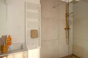 Master suite with queen-size bed, walk-in closet and powder room