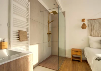 Master suite with queen-size bed, walk-in closet and powder room