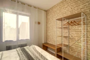 Master bedroom with queen-size bed, walk-in closet and en-suite shower room