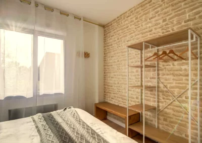 Master bedroom with queen-size bed, walk-in closet and en-suite shower room