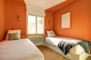 Secondary bedroom with two single beds