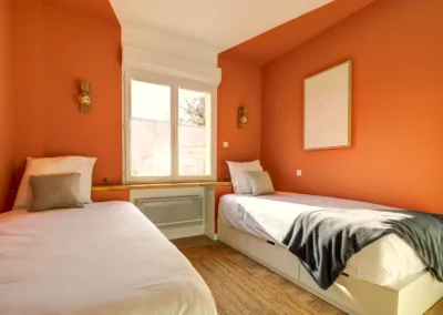 Secondary bedroom with two single beds