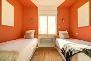 Secondary bedroom with two single beds