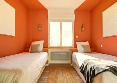 Secondary bedroom with two single beds