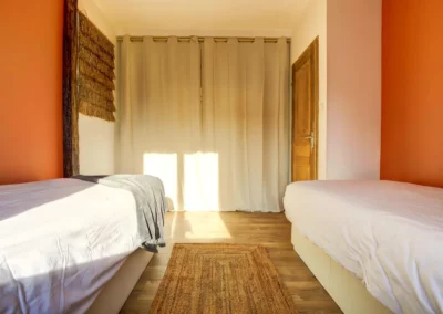 Secondary bedroom with two single beds