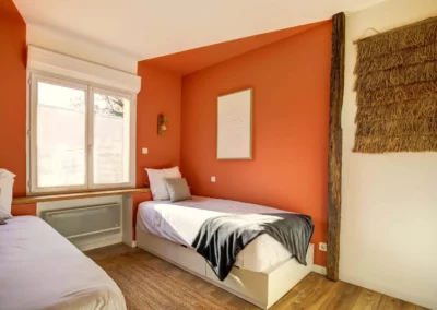 Secondary bedroom with two single beds