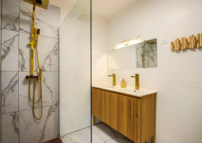 Bathroom with double sink and heated towel rail