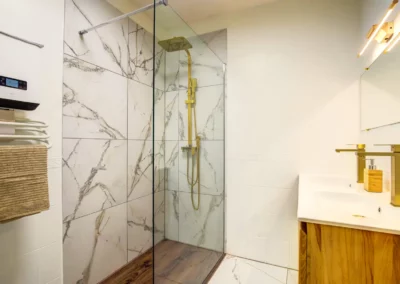 Bathroom with double sink and heated towel rail