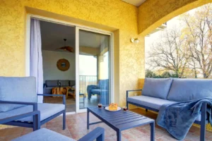 Terrace with garden furniture and outdoor dining table overlooking the countryside