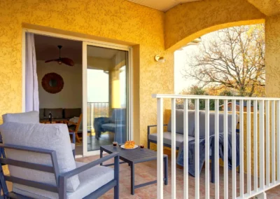 Terrace with garden furniture and outdoor dining table overlooking the countryside